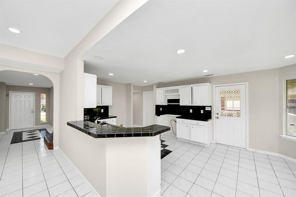 Interior, Kitchen, Recessed Lighting, Tile Countertops