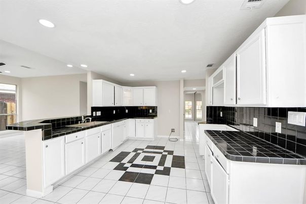 Interior, Kitchen, Recessed Lighting, Tile Countertops