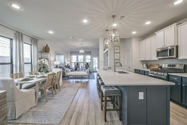 Chandelier, Dining room, Interior, Kitchen, Living room, Pendant Lights, Recessed Lighting, Stainless Steel Appliances, Wood Texture Flooring