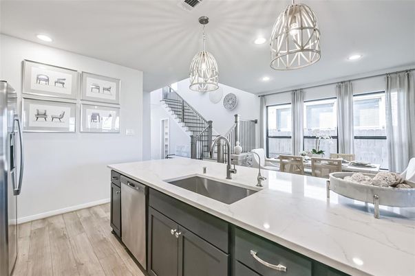 Dining room, Interior, Kitchen, Pendant Lights, Recessed Lighting, Stainless Steel Appliances, Wood Texture Flooring
