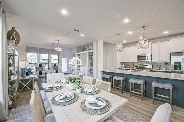Chandelier, Dining room, Interior, Kitchen, Living room, Pendant Lights, Recessed Lighting, Stainless Steel Appliances, Wood Texture Flooring