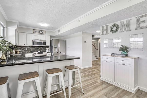 Interior, Kitchen, Recessed Lighting, Stainless Steel Appliances, Wood Texture Flooring