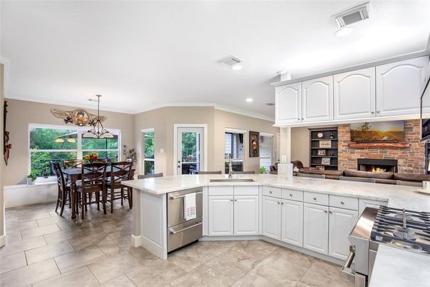 Chandelier, Dining room, Fireplace, Interior, Kitchen, Pendant Lights, Recessed Lighting, Stone Walls