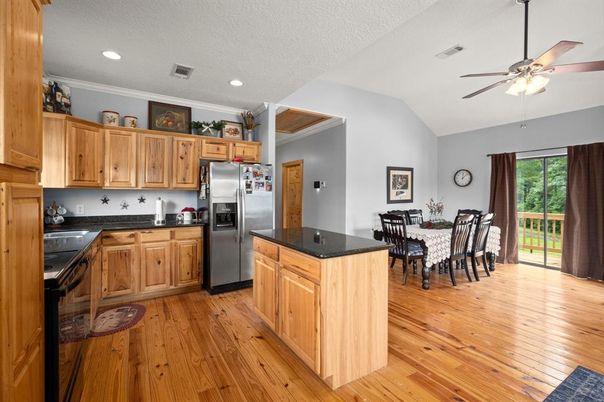 Dining room, Interior, Kitchen, Recessed Lighting, Stainless Steel Appliances, Wood Texture Flooring