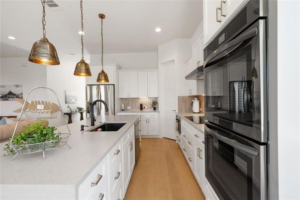 Interior, Kitchen, Pendant Lights, Recessed Lighting, Stainless Steel Appliances, Wood Texture Flooring