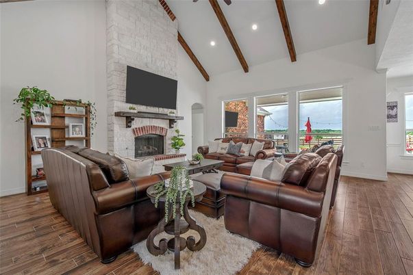 Fireplace, Interior, Living room, Recessed Lighting, Stone Walls, Wooden Beams, Wood Texture Flooring