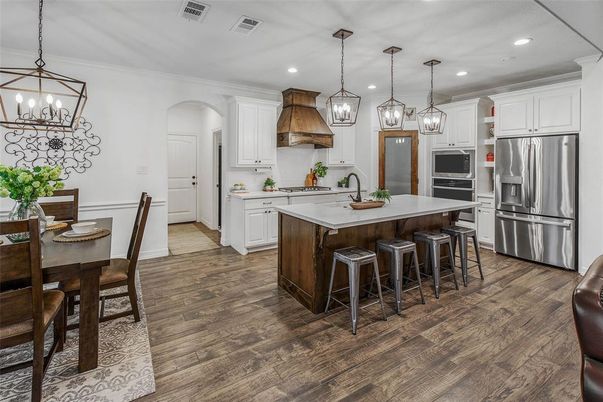 Dining room, Interior, Kitchen, Pendant Lights, Recessed Lighting, Stainless Steel Appliances, Wood Texture Flooring
