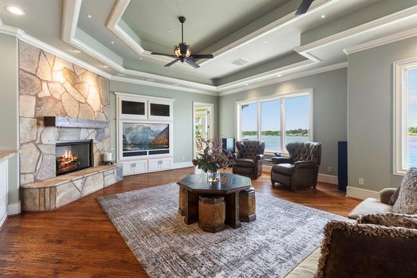 Fireplace, Interior, Living room, Recessed Lighting, Stone Walls, Wood Texture Flooring