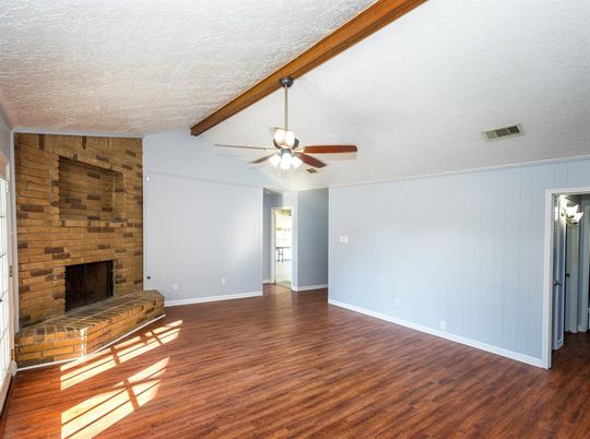 Empty room, Fireplace, Interior, Stone Walls, Wooden Beams, Wood Texture Flooring
