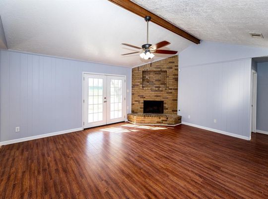 Empty room, Fireplace, Interior, Stone Walls, Wooden Beams, Wood Texture Flooring