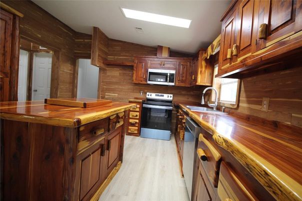 Interior, Kitchen, Stainless Steel Appliances, Wood Texture Flooring, Wooden Walls