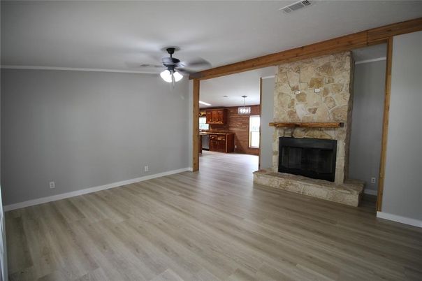 Empty room, Fireplace, Interior, Pendant Lights, Stone Walls, Wood Texture Flooring