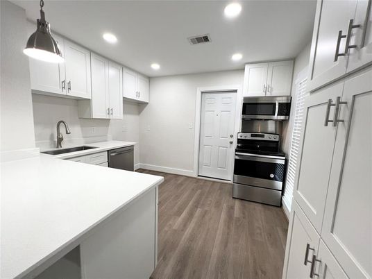 Interior, Kitchen, Pendant Lights, Recessed Lighting, Stainless Steel Appliances, Wood Texture Flooring