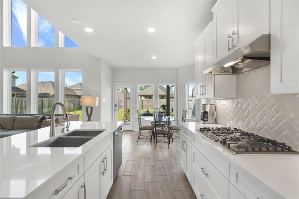 Dining room, Interior, Kitchen, Recessed Lighting, Stainless Steel Appliances, Wood Texture Flooring