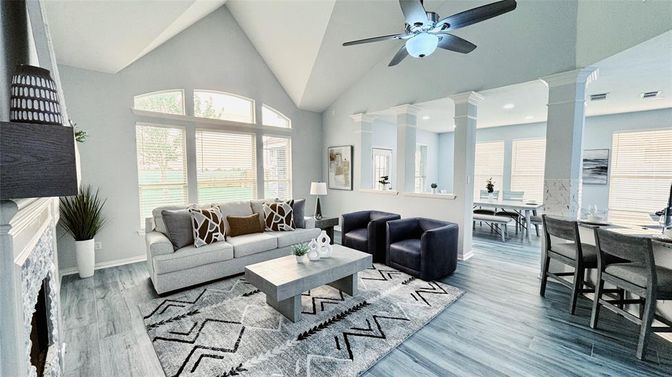 Dining room, Fireplace, Interior, Living room, Recessed Lighting, Wood Texture Flooring