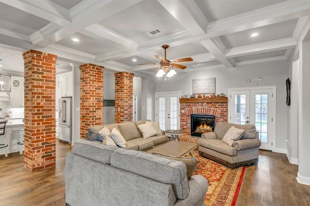 Fireplace, Interior, Living room, Recessed Lighting, Stone Walls, Wood Texture Flooring