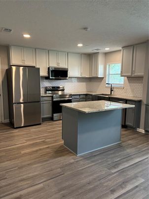 Interior, Kitchen, Recessed Lighting, Stainless Steel Appliances, Wood Texture Flooring