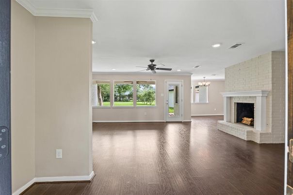 Chandelier, Empty room, Fireplace, Interior, Recessed Lighting, Wood Texture Flooring