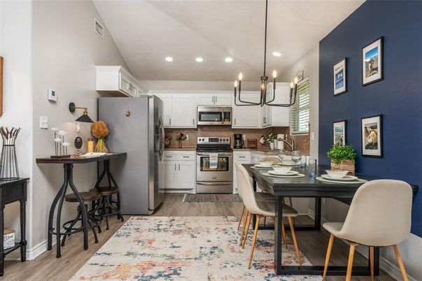 Dining room, Interior, Kitchen, Pendant Lights, Recessed Lighting, Stainless Steel Appliances, Wood Texture Flooring