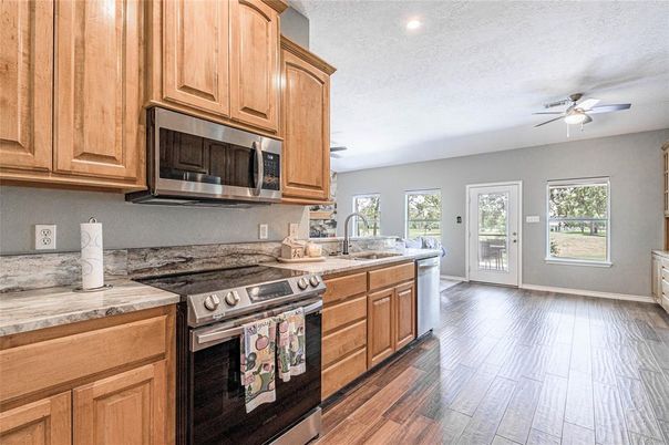 Interior, Kitchen, Recessed Lighting, Stainless Steel Appliances, Wood Texture Flooring