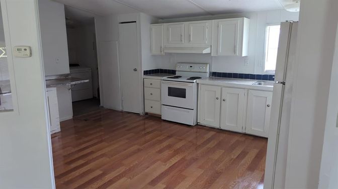 Interior, Kitchen, Tile Countertops, Wood Texture Flooring