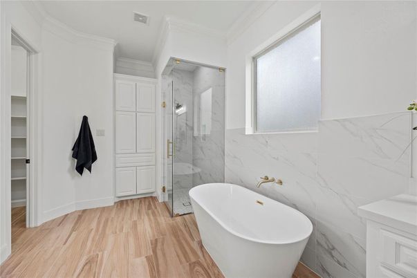 Bathroom, Free Standing Baths, Glass Shower, Interior, Marble Walls, Wood Texture Flooring