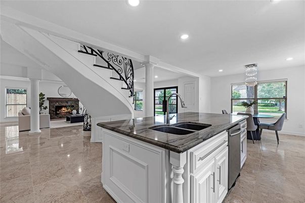 Chandelier, Dining room, Fireplace, Interior, Kitchen, Living room, Pendant Lights, Recessed Lighting