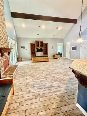 Fireplace, Interior, Pendant Lights, Recessed Lighting, Stone Walls, Wooden Beams, Wood Texture Flooring