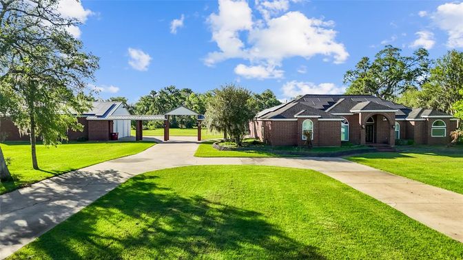 Backyard, Exterior, Facade, Brick Facade, Solar Panels, Ranch