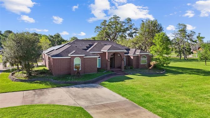 Backyard, Exterior, Facade, Brick Facade, Solar Panels, Brick Traditional