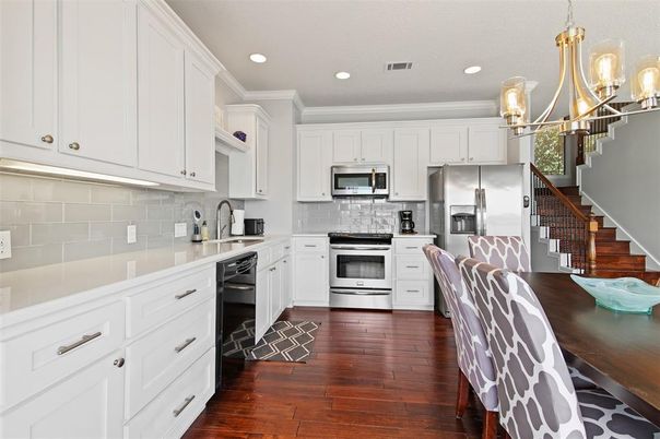 Chandelier, Interior, Kitchen, Pendant Lights, Recessed Lighting, Stainless Steel Appliances, Wood Texture Flooring