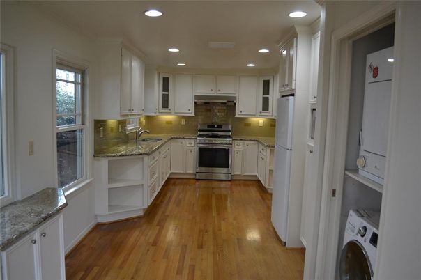 Interior, Kitchen, Recessed Lighting, Washer, Wood Texture Flooring