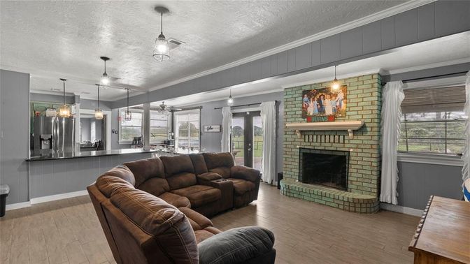 Fireplace, Interior, Kitchen, Living room, Pendant Lights, Stone Walls, Wood Texture Flooring