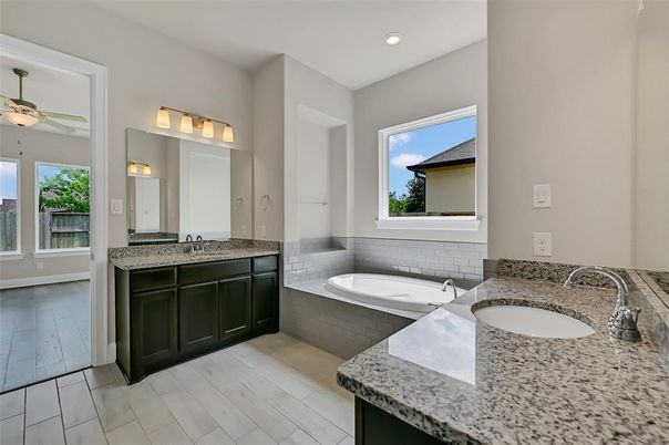 Bathroom, Dual Sink Vanities, Interior, Recessed Lighting, Wood Texture Flooring