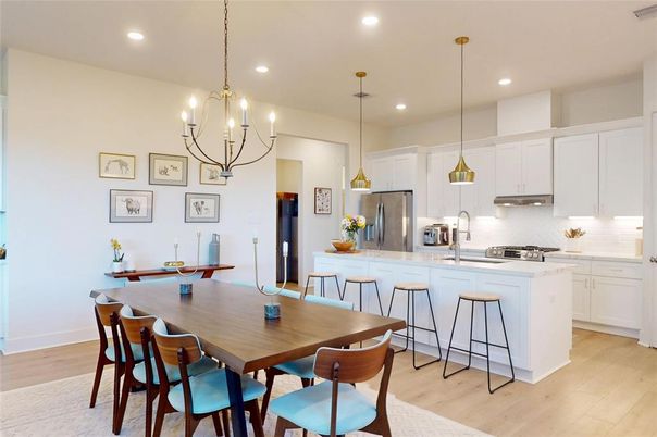 Chandelier, Dining room, Interior, Kitchen, Pendant Lights, Recessed Lighting, Stainless Steel Appliances, Wood Texture Flooring