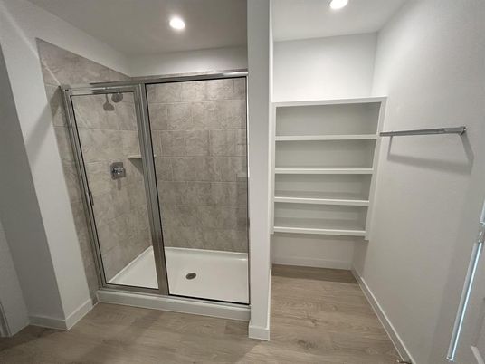 Bathroom, Glass Shower, Interior, Recessed Lighting, Wood Texture Flooring