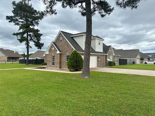 Attached, Backyard, Exterior, Facade, Brick Facade, Brick Traditional