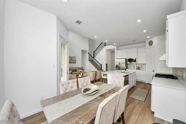 Dining room, Interior, Kitchen, Recessed Lighting, Stainless Steel Appliances, Wood Texture Flooring