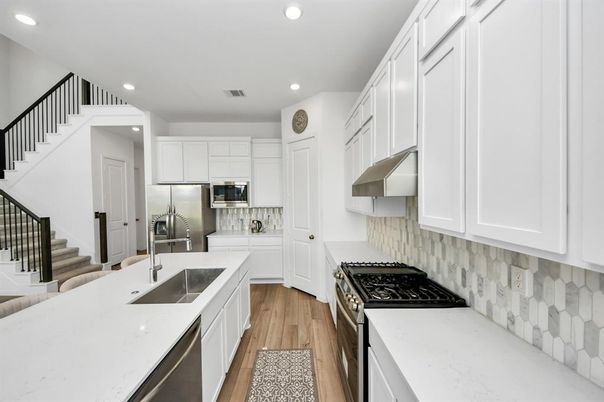 Interior, Kitchen, Recessed Lighting, Stainless Steel Appliances, Wood Texture Flooring