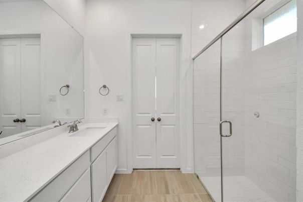 Bathroom, Dual Sink Vanities, Glass Shower, Interior, Wood Texture Flooring