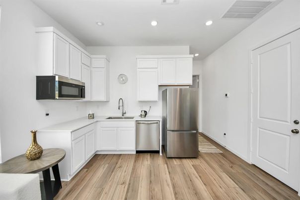 Interior, Kitchen, Recessed Lighting, Stainless Steel Appliances, Wood Texture Flooring