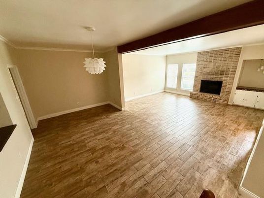 Empty room, Fireplace, Interior, Pendant Lights, Stone Walls, Wood Texture Flooring