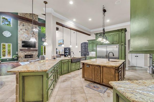 Fireplace, Interior, Kitchen, Pendant Lights, Recessed Lighting, Stainless Steel Appliances, Stone Walls