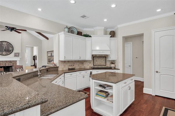 Dining room, Fireplace, Interior, Kitchen, Recessed Lighting, Wooden Beams, Wood Texture Flooring
