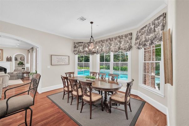 Dining room, Fireplace, Interior, Pendant Lights, Wood Texture Flooring