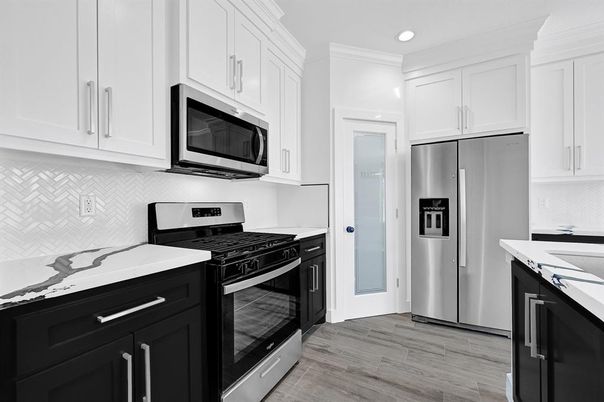 Interior, Kitchen, Recessed Lighting, Stainless Steel Appliances, Wood Texture Flooring