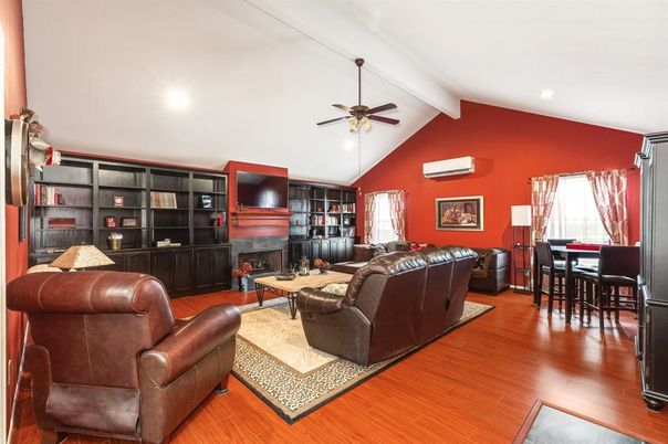 Dining room, Fireplace, Interior, Living room, Recessed Lighting, Wood Texture Flooring