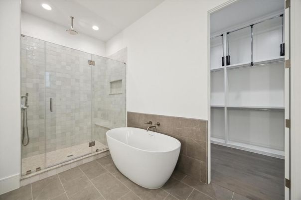 Bathroom, Free Standing Baths, Glass Shower, Interior, Recessed Lighting, Wood Texture Flooring
