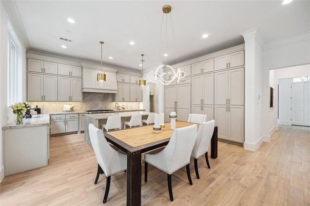 Dining room, Interior, Kitchen, Pendant Lights, Recessed Lighting, Stainless Steel Appliances, Wood Texture Flooring
