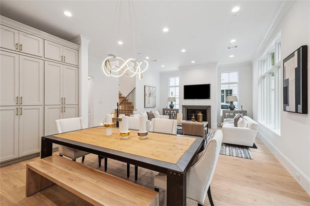 Dining room, Fireplace, Interior, Living room, Pendant Lights, Recessed Lighting, Wood Texture Flooring
